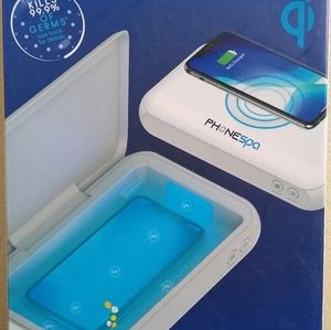 New Phone and accessory sanitizer with charging pad.
